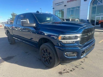 Photo of a 2024 RAM 3500 4X4 Laramie 4DR Mega Cab 6.3 FT. SB SRW Pickup for sale