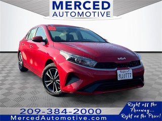 2024 Kia Forte with Currant Red Exterior