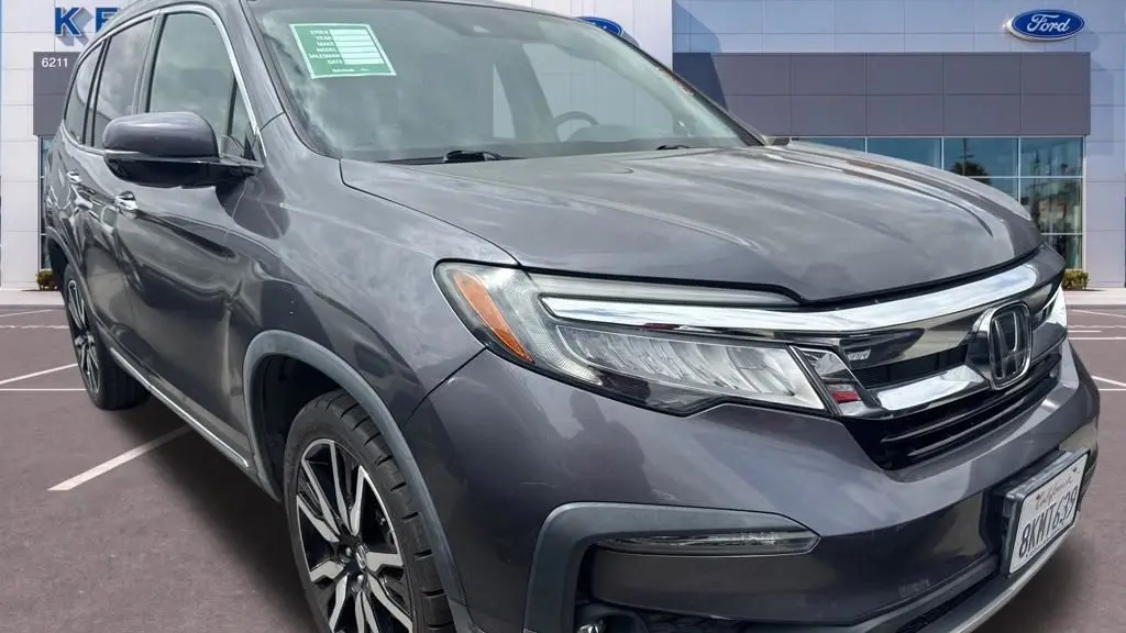 Preowned 2019 Honda Pilot Touring w/Rear Captain's Chairs for Sale