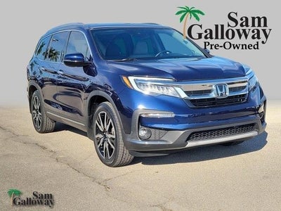 Photo of a 2020 Honda Pilot Touring 4DR SUV W/REAR Captain's Chairs for sale