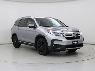 Photo of a 2022 Honda Pilot AWD Touring 4DR SUV W/REAR Captain's Chairs for sale