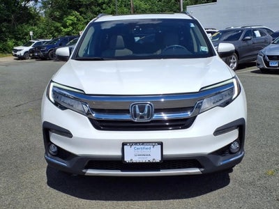 Photo of a 2022 Honda Pilot AWD Touring 4DR SUV W/REAR Captain's Chairs for sale