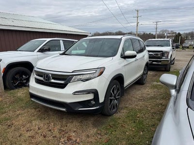 Photo of a 2022 Honda Pilot AWD Touring 4DR SUV W/REAR Captain's Chairs for sale