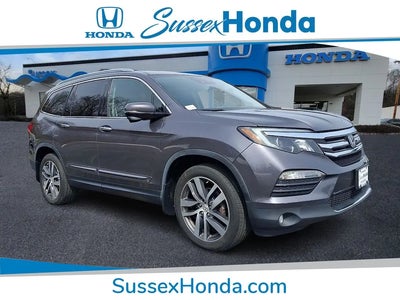 Photo of a 2018 Honda Pilot AWD Touring 4DR SUV for sale