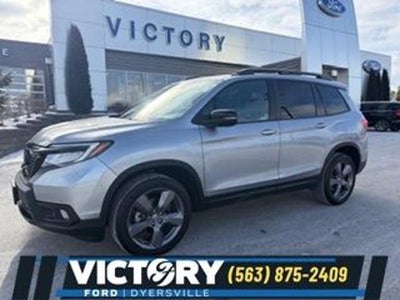 Photo of a 2021 Honda Passport AWD Touring 4DR SUV for sale