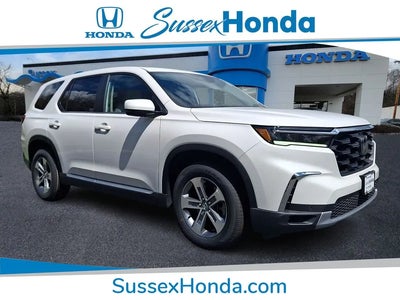 Photo of a 2023 Honda Pilot AWD EX-L 4DR SUV W/REAR Captain's Chairs for sale