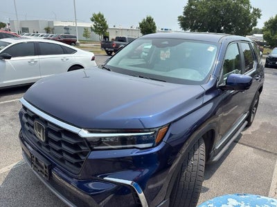 Photo of a 2023 Honda Pilot AWD EX-L 4DR SUV W/REAR Captain's Chairs for sale