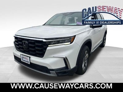 Photo of a 2023 Honda Pilot AWD EX-L 4DR SUV W/REAR Captain's Chairs for sale