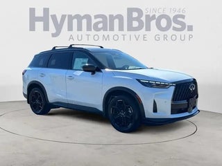 2026 INFINITI QX60 with Radiant White/Black Obsidian Exterior