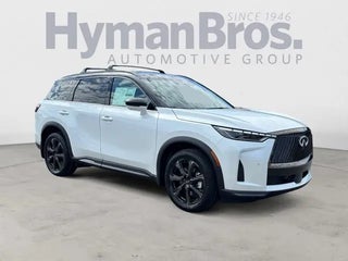 2026 INFINITI QX60 with Radiant White/Black Obsidian Exterior