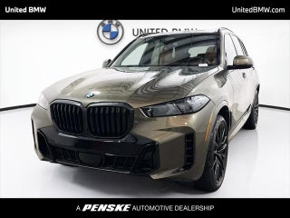 2026 BMW X5 with Manhattan Green Metallic Exterior