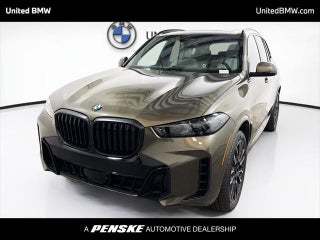 2026 BMW X5 with Manhattan Green Metallic Exterior
