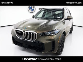 2026 BMW X5 with Manhattan Green Metallic Exterior
