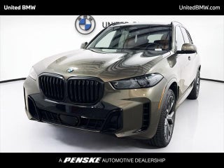 2026 BMW X5 with Manhattan Green Metallic Exterior