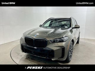 2026 BMW X5 with Manhattan Green Metallic Exterior