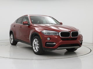 2015 BMW X6 with Flamenco Red Metallic Exterior