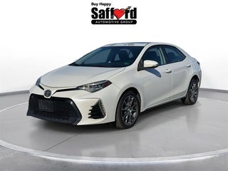 2017 Toyota Corolla with Blizzard Pearl Exterior