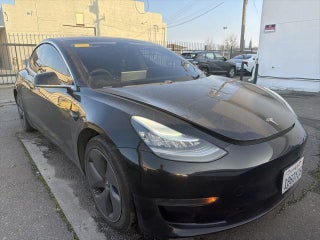 2020 Tesla Model 3 with Solid Black Exterior