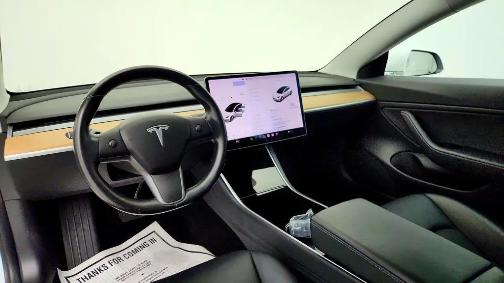 2018 Tesla Model 3 - $23,495