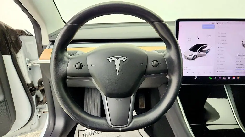 2018 Tesla Model 3 - $23,495