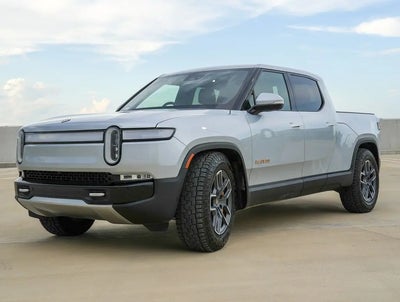 Photo of a 2023 Rivian R1T AWD Adventure Quad Motor 4DR Crew Cab 4.5 FT. SB for sale