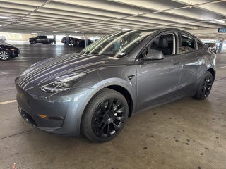 2023 Tesla Model Y with Midnight Silver Metallic Exterior