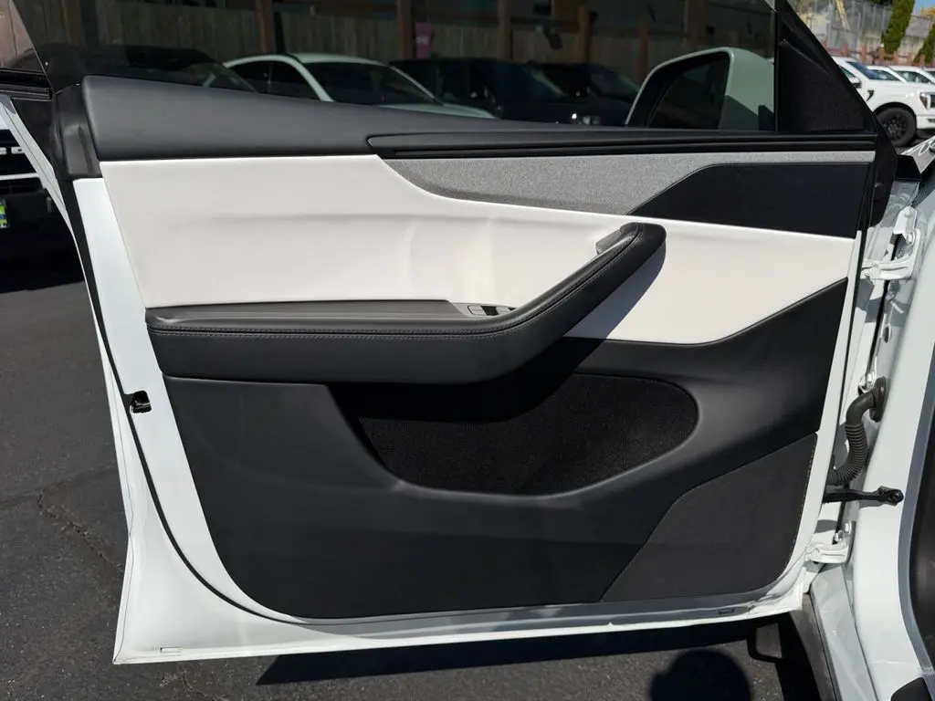 2026 Tesla Model Y - $49,999
