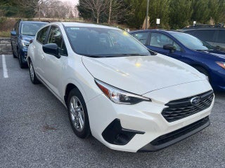 2025 Subaru Impreza with Crystal White Pearl Exterior