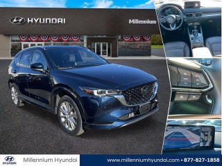 2023 Mazda CX-5 with Deep Crystal Blue Mica Exterior