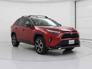 2024 Toyota RAV4 Prime with Supersonic Red/Midnight Black Metallic Exterior