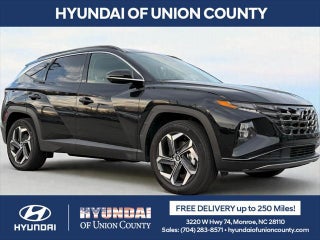 2024 Hyundai TUCSON Hybrid with Black Pearl Exterior