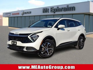 2023 Kia Sportage Hybrid with Snow White Pearl Exterior