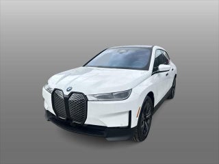 2025 BMW iX with Alpine White Exterior