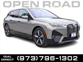 2025 BMW iX with Oxide Grey Metallic Exterior