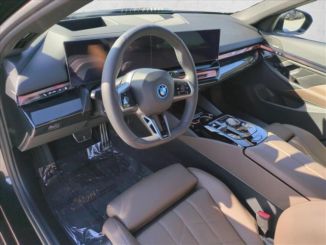 2026 BMW 550e - $64,914
