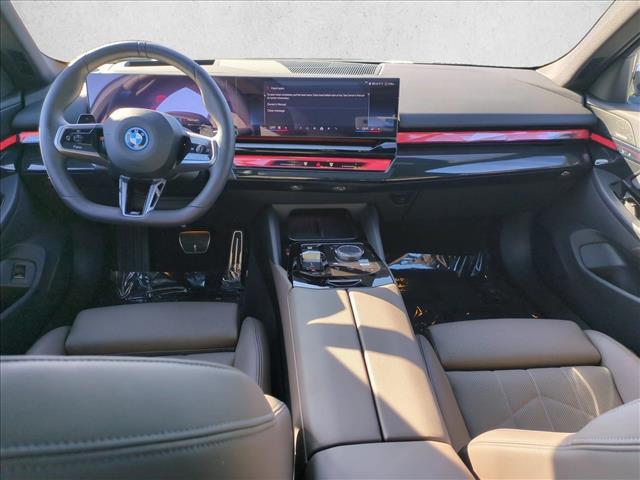 2026 BMW 550e - $64,914