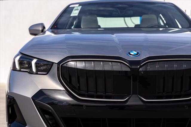 2026 BMW 550e - $73,988