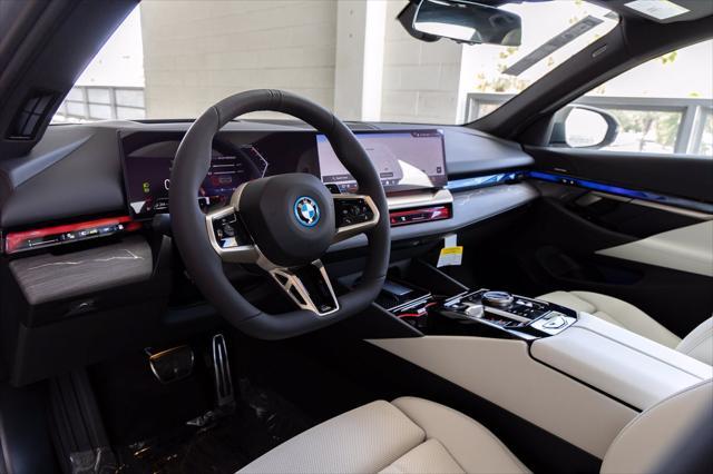 2026 BMW 550e - $73,988