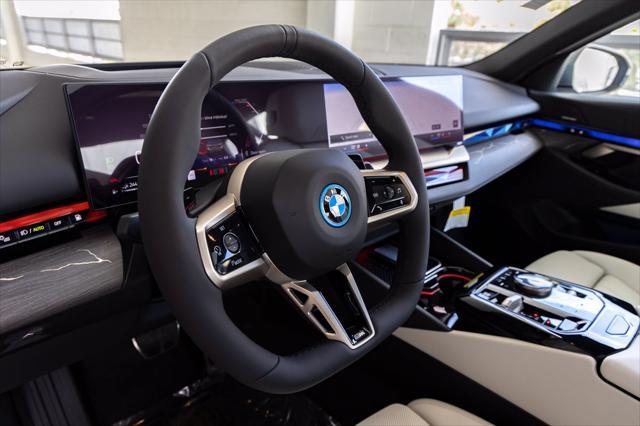 2026 BMW 550e - $73,988