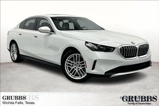 2025 BMW 5 Series with Mineral White Metallic Exterior