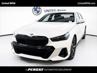 2026 BMW 5 Series with Alpine White Exterior