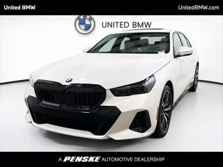 2026 BMW 5 Series with Mineral White Metallic Exterior