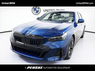 2026 BMW 5 Series with Phytonic Blue Metallic Exterior