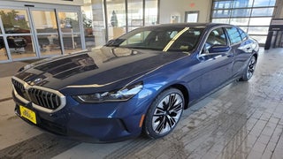 2026 BMW 5 Series with Phytonic Blue Metallic Exterior