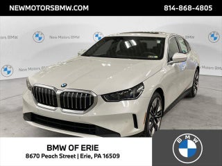 2026 BMW 5 Series with Mineral White Metallic Exterior