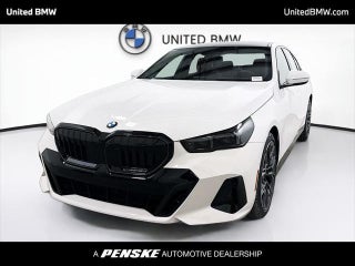 2026 BMW 5 Series with Alpine White Exterior
