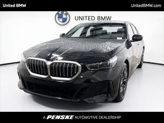 2026 BMW 5 Series with Black Sapphire Metallic Exterior