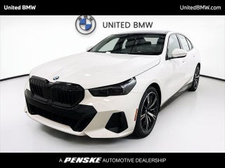 2026 BMW 5 Series with Alpine White Exterior