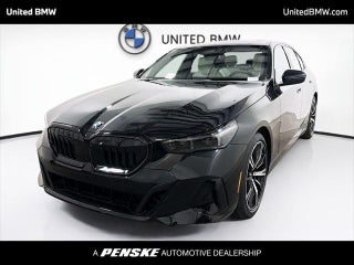 2026 BMW 5 Series with Black Sapphire Metallic Exterior