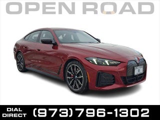 2025 BMW i4 with Vegas Red Metallic Exterior